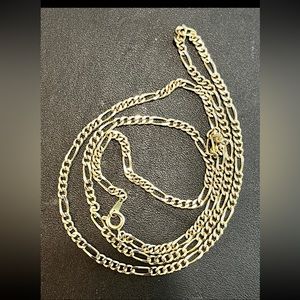 Figaro chain necklace gold tone. Approximately 24 inches.